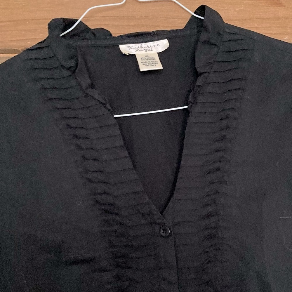 Like new black cotton button down with lovely v neck and slight ruffle at collar